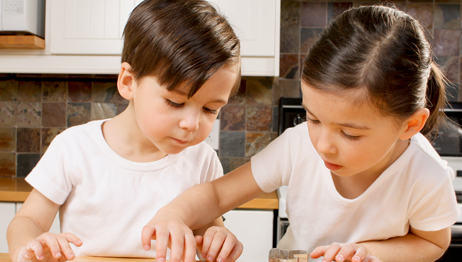 Image of children working on something